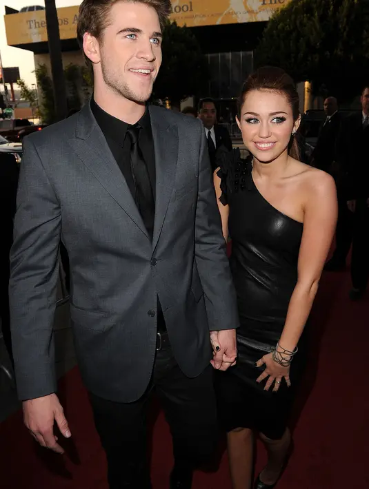 Pernah tersiar kabar Miley Cyrus dan Liam Hemsworth akan menggelar pesta pernikahan di musim panas. Namun semua itu dibatalkan termasuk dengan rencana bulan madu mereka. (AFP/Bintang.com)