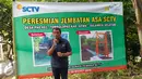GM Planning Schedulling and Research Development SCTV, Doni Arianto memberikan sambutan saat peresmian Jembatan Asa Asa ke-8 yang berada Desa PAO Kec.Tombolopao Kab.Gowa, Sulawesi Selatan, Minggu (20/3). (Liputan6.com/dok SCTV)