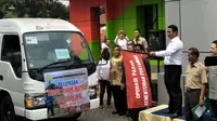 Menteri Pertanian Amran Sulaiman melepas operasi pasar telur ayam murah di Toko Tani Indonesia Centre (TTIC). di Jakarta, Kamis (19/7/2018). (Septian Deny/Liputan6.com)
