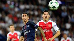 Grup A - Dalam bigmatch pertama Liga Champions, Arsenal berhasil menahan imbang tuan rumah PSG dengan skor 1-1. Sementara itu FC Gale juga berbagi angka 1-1 dengan wakil Bulgaria, Lodogorets. (AFP/Franck Fife)