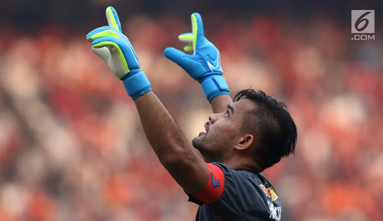 Kapten tim Persija, Andritany merayakan gol yang dicetak Marko Simic ke gawang Arema FC pada lanjutan Shopee Liga 1 Indonesia 2019 di Stadion Gelora Bung Karno, Jakarta, Sabtu (3/8/2019). Laga berakhir imbang 2-2. (Liputan6.com/Helmi Fithriansyah)
