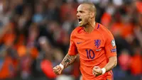 Meski sudah berusia 33 tahun namun hingga kini Wesley Sneijder tetap menjadi pilihan utama di lini tengah Timnas Belanda. (AFP/Jerry Lampen)