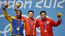 Pada Olimpiade London 2012, Eko Yuli Irawan yang berlomba di kelas 62 kg kembali membawa pulang medali perunggu dengan angkatan total 317 kg. (AFP/Yuri Cortez)