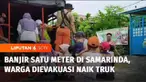 Curah hujan yang tinggi memicu banjir setinggi 1 meter di Samarinda, Kalimantan Timur. Sejumlah warga terjebak banjir dan harus dievakuasi dengan truk.