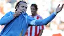 Uruguayan forward Diego Forlan celebrates after scoring the 2nd goal of the final of the 2011 Copa America football tournament held at the Monumental stadium in Buenos Aires, on July 24, 2011.  AFP PHOTO / ALEJANDRO PAGNI