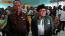 Menteri Ristek dan Dikti, M Nasir bersama Ketua Umum PKB Muhaimin Iskandar di peringatan Haul ke-5 Gus Dur, Jakarta, Selasa (23/12/2014). (Liputan6.com/Johan Tallo)