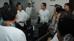 Suasana pamitan Jokowi dengan PNS DKI yang berkantor di Balaikota tampak hangat, Jakarta, (17/10/14). (Liputan6.com/Herman Zakharia) 