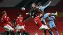 Henderson hanya kebobolan 12 gol dalam 13 pertandingan di Liga Inggris musim lalu. Jika melihat statistik tersebut, tidak mengherankan jika posisi penjaga gawang utama Manchester United musim depan akan diisi oleh Henderson. (Foto: AFP/Pool/Clive Brunskill)