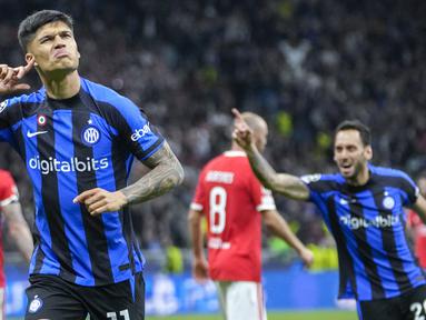 Inter Milan berhasil melaju ke babak semifinal setelah menyingkirkan Benfica. Pada duel di Giuseppe Meazza, I Nerazzurri bermain imbang lawan Benfica dengan skor 3-3. (AP Photo/Luca Bruno)