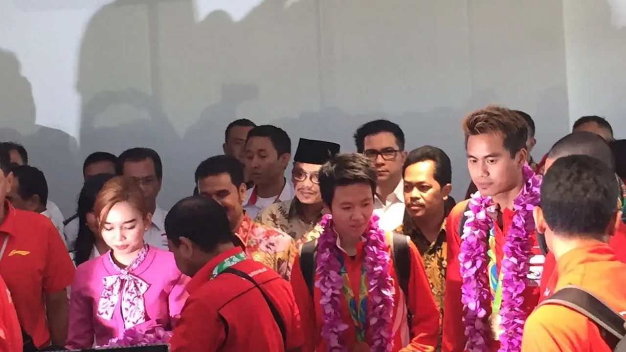 Tontowi Ahmad/Liliyana Natsir mendapat sambut luar biasa setibanya di Bandara Soekarno Hatta, Selasa (23/8/2016). (istimewa)