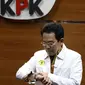 Wakil Ketua KPK Johanis Tanak sesaat sebelum membacakan penetapan tersangka dan penahanan Wakil Ketua DPRD Provinsi Jawa Timur 2019-2024, Sahat Tua P. Simandjuntak di Gedung Merah Putih Komisi Pemberantasan Korupsi (KPK), Jakarta, Kamis (15/12/2022). Sahat Tua P. Simandjuntak bersama tiga orang lainnya terjerat OTT KPK berikut barang bukti uang dengan nilai seluruhnya Rp1 miliar. (Liputan6.com/Helmi Fithriansyah)