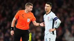 Meski dapat hasil seri, Portugal masih memimpin klasemen Grup A1 dengan 10 poin dan unggul tiga angka atas Kroasia. Sementara bagi Skotlandia, ini jadi poin perdana mereka di UEFA Nations League. (Andrew Milligan/PA via AP)