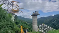 Sebuah platform konstruksi di jembatan kereta api yang sedang dibangun di timur laut India runtuh pada hari Rabu, menewaskan sedikitnya 26 pekerja dan melukai dua lainnya, kata seorang pejabat. (AFP Photo)