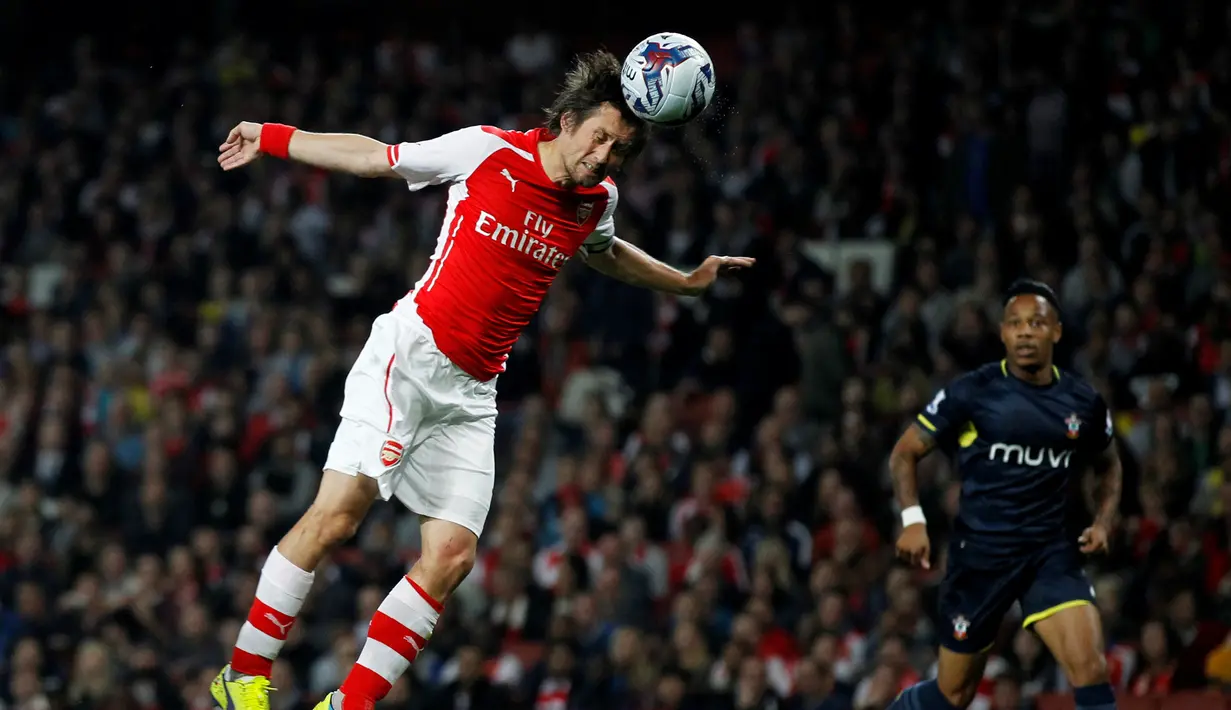 Tomas Rosicky telah menghabiskan 10 tahun kariernya di Arsenal. Permainannya yang apik membuat Rosicky dicintai fans The Gunners. (AFP/Ian Kington)