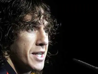 Bek Spanyol Carles Puyol di sesi konferensi pers yang berlangsung di North West University Sports Village, Potchefstroom, 8 Juli 2010, tiga hari sebelum laga final PD 2010 lawan Belanda. AFP PHOTO / LLUIS GENE 
