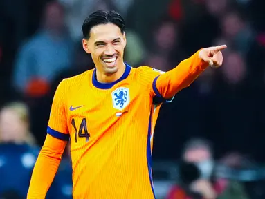 Pemain Timnas Belanda, Tijjani Reijnders, melakukan selebrasi setelah memcetak gol ke gawang Lituania pada laga terakhir Grup G kualifikasi zona Eropa di Stadion Johan Cruijff ArenA, Amsterdam, Senin (17/11/2025). (AP Photo/Peter Dejong)