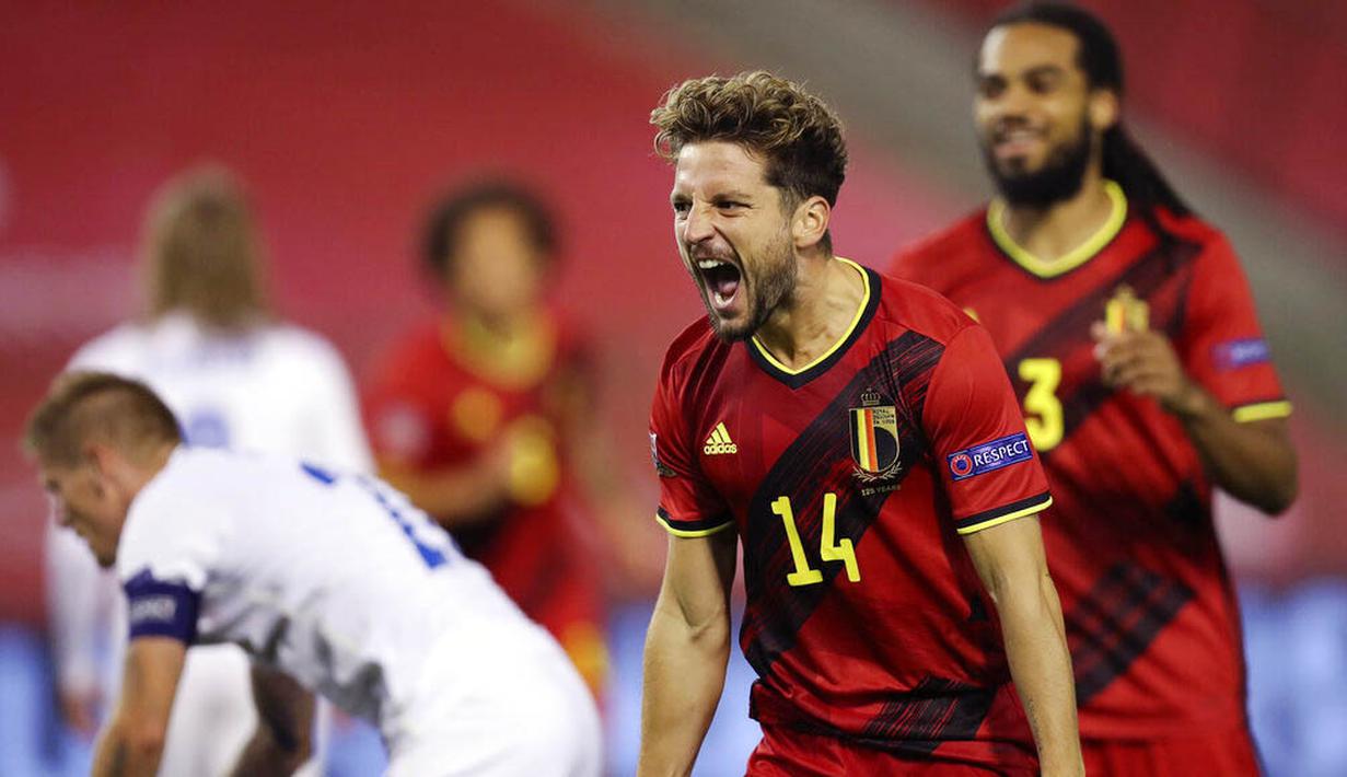 Pemain Belgia, Dries Mertens, melakukan selebrasi usai mencetak gol ke gawang Islandia pada laga UEFA Nations League di Stadion King Baudouin, Rabu (9/9/2020). Belgia menang telak dengan skor 5-1. (AP/Francisco Seco)
