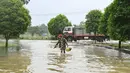Banjir disebabkan tingginya curah hujan yang mengguyur kota Hpa Yar Gyi di wilayah Bago, Myanmar. (SAI AUNG MAIN/AFP)
