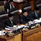 Ketua DPR Bambang Soesatyo (dua kiri) bersama tiga Wakil Ketua DPR Fadli Zon, Agus Hermanto, dan Fahri Hamzah, memimpin Sidang Paripurna di Gedung Nusantara II, Kompleks Parlemen, Senayan, Jakarta, Rabu (14/2. (Liputan6.com/JohanTallo)