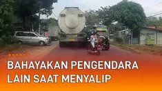 Aksi nekat dan membahayakan dilakukan oleh sopir sebuah mobil ini mengundang perhatian