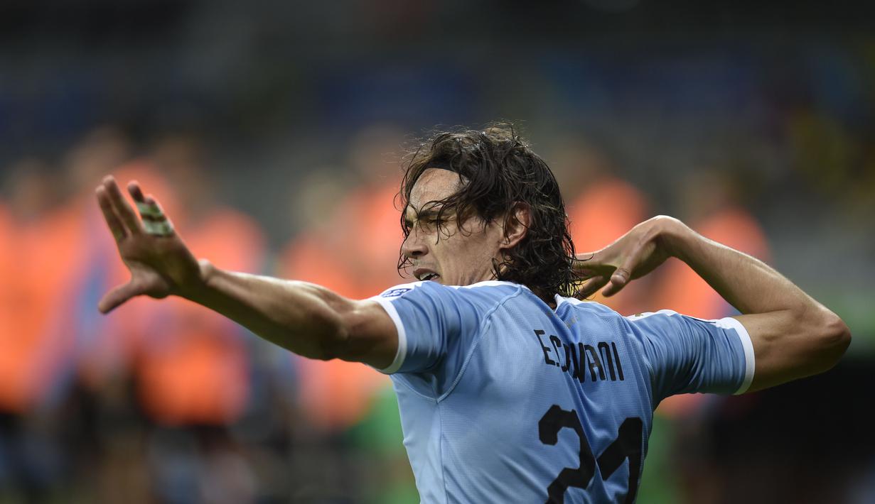 Selebrasi golnya itu berkaitan dengan penduduk asli Uruguay, suku Charrua, yang piawai dalam berburu menggunakan panah. (Foto: AFP/Douglas Magno)