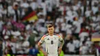 Ekspresi gelandang timnas Jerman, Toni Kroos usai pertandingan perempat final Euro 2024 melawan Spanyol di Stuttgart Arena, Stuttgart, 5 Juli 2024. (Tobias SCHWARZ/AFP)