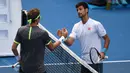 Novak Djokovic menjadi petenis tunggal putra terakhir berstatus juara bertahan yang tersingkir paling cepat dan gagal mempertahankan gelarnya. Setelah menjuarai Australia Open 2016, Novak Djokovic tersingkir pada babak kedua Australia Open 2017 dari petenis asal Uzbekistan, Denis Istomin. (AFP/Saeed Khan)