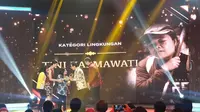 Tini Kasmawati Memperoleh Penghargaan Liputan6 Awards 2019 Kategori Lingkungan pada Sabtu (25/5/2019). (Foto: Nanda Perdana Putra)
