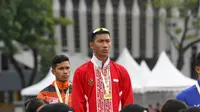 Ahmad Ambali Sukur berhasil meraih medali emas dari cabang atletik nomor lompat jauh di ajang ASEAN School Games (ASG) 2018.