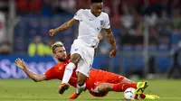 Swiss vs Inggris (FABRICE COFFRINI / AFP)
