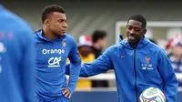 Dua bintang Timnas Prancis di Piala Dunia 2026, Kylian Mbappe dan Ousmane Dembele. (AFP/FRANCK FIFE)