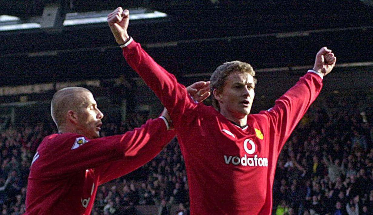 5. Ole Gunnar Solskjaer - Meski kerap menjadi cadangan, striker berjuluk Baby Face ini memiliki peran penting di MU. Mantan pemain Molde ini menjadi aktor penting kala Setan Merah juara Liga Champions 1998/1999. (AFP/Robin Parker)