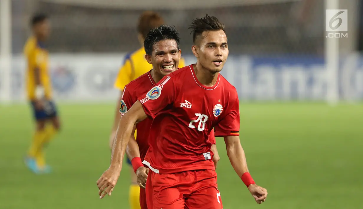 Pemain Persija, Rezaldi Hehanusa berlari merayakan gol yang dicetaknya ke gawang Tampines Rovers pada laga grup H Piala AFC 2018 di Stadion GBK, Jakarta, Rabu (28/2). Babak pertama Persija unggul 2-0. (Liputan6.com/Helmi Fithriansyah)
