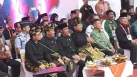 Presiden Republik Indonesia, Joko Widodo menghadiri acara penutupan Kejuaraan Dunia Pencak Silat di Denpasar Bali. (Liputan6.com/Marco Tampubolon)