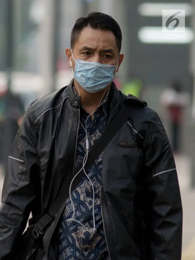Kualitas Udara Jakarta Buruk, Warga Beraktivitas Pakai Masker