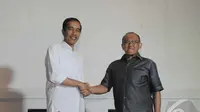  Presiden terpilih Joko Widodo bertemu dengan Ketua Umum Partai Golkar Aburizal Bakrie (ARB), Jakarta, Selasa (14/10/2014) (Liputan6.com/Herman Zakharia)