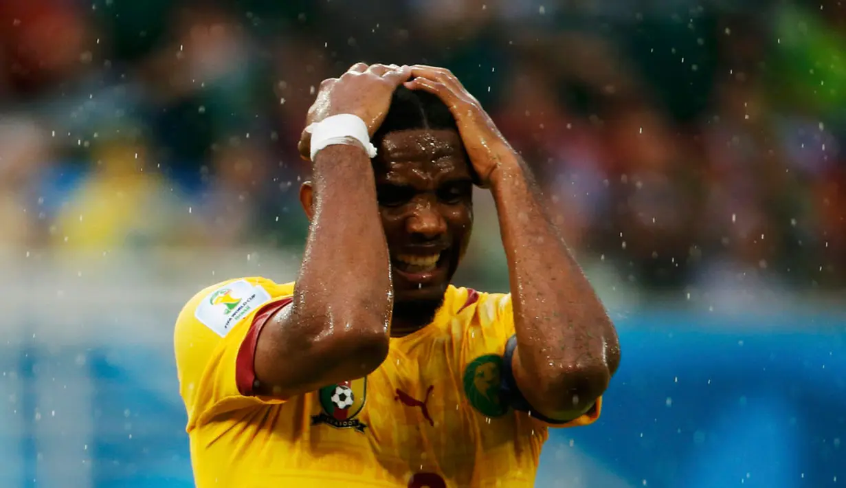 Ekspresi penyerang Kamerun, Samuel Eto'o, setelah gagal memanfaatkan peluang mencetak gol ke gawang Meksiko di babak penyisihan grup A Piala Dunia 2014 di Estadio das Dunas, Natal, Brasil, (13/6/2014). (REUTERS/Jorge Silva)