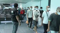 Ratusan mantan tahanan atau ex Deteni Malaysia, akhirnya bisa pulang dan tiba di Terminal 3 Bandara Internasional Soekarno Hatta (Soetta), Sabtu (7/11/2020). (Foto: Liputan6/Pramita Tristiawati)