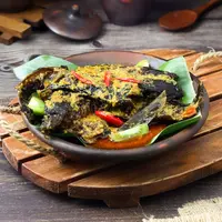 ilustrasi lele asap mangut/Nunung L/Shutterstock
&nbsp;