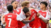 Pemain Arsenal merayakan gol yang dicetak oleh Kai Havertz ke gawang Paris Saint-Germain (PSG) dalam pertandingan final Liga Champions 2025/2026 di Puskas Arena, Budapest, Sabtu (30/5/2026). (INA FASSBENDER / AFP)