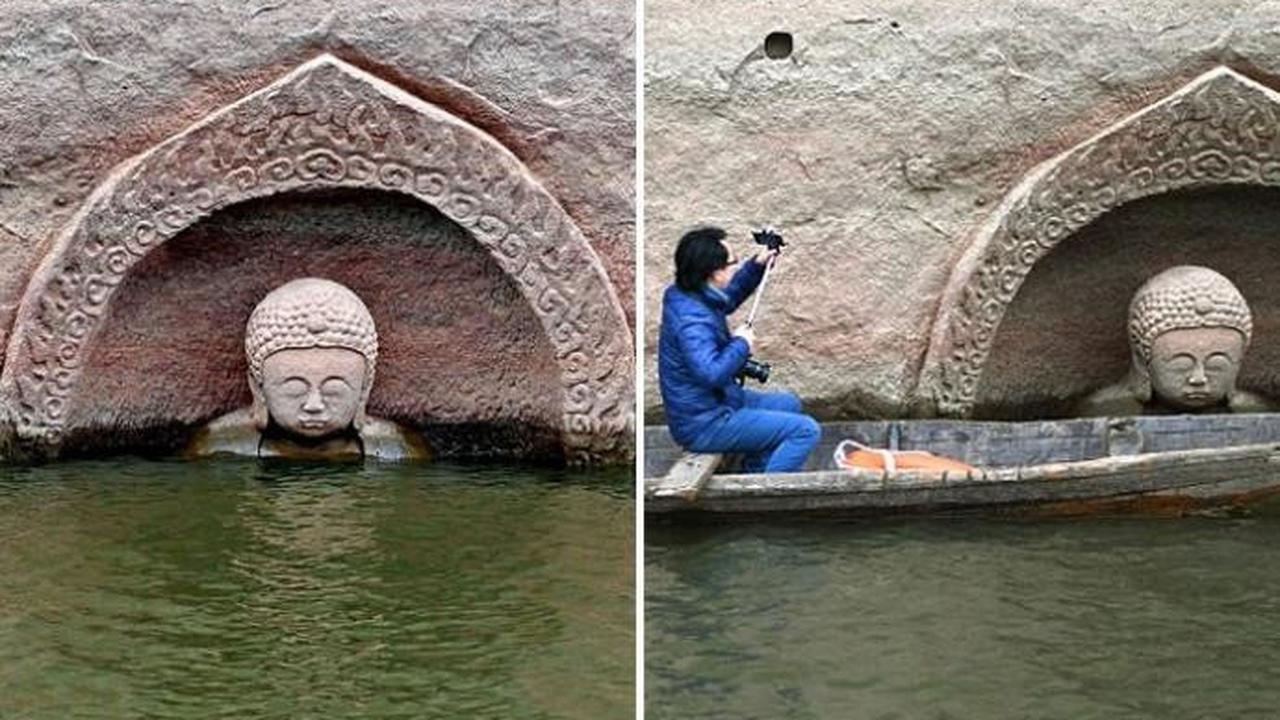 Ilmuwan berharap, patung Buddha yang menyembul dari permukaan waduk menjadi petunjuk 'harta karun'