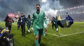 Penjaga gawang Timnas Italia, Gianluigi Donnarumma, berjalan keluar lapangan usai pertandingan final play-off kualifikasi Piala Dunia 2026 melawan Bosnia dan Herzegovina di Stadion Bilino Polje, Zenica, Selasa 31 Maret 2026 waktu setempat atau Rabu 1 April 2026 dini hari WIB. Timnas Italia dipastikan gagal tampil di Piala Dunia 2026. (Fabio Ferrari/LaPresse via AP)