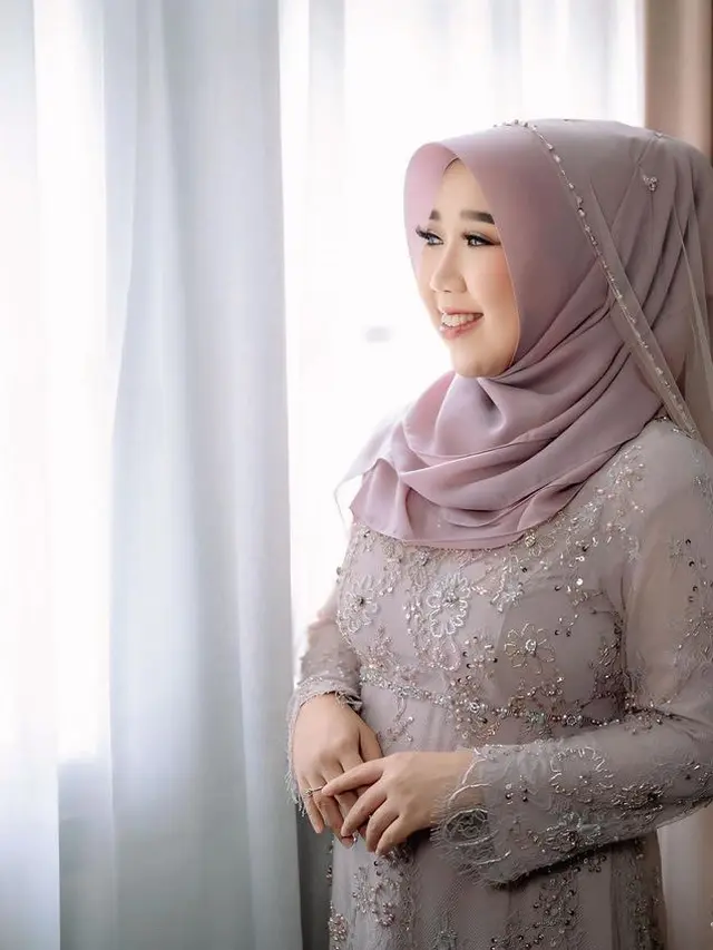 Kiky Saputri saat tasyakuran empat bulanan kehamilan. [@windrafotografi]