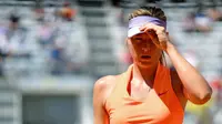 Petenis Rusia Maria Sharapova dipastikan absen di Grand Slam Prancis Terbuka 2017. (EPA/Ettatore Ferrari)