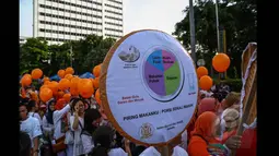 Kegiatan memperingati Hari Gizi Nasional ini diadakan dalam rangka mendukung peningkatan kesadaran dan kepedulian masyarakat akan gizi seimbang dan pola makan sehat, Jakarta, Minggu (25/1/2015). (Liputan6.com/Faizal Fanani)