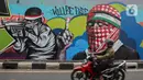 Karya seni mural tersebut dibuat oleh sejumlah seniman mural dan grafiti sebagai bentuk dukungan dan solidaritas untuk bangsa Palestina. (Liputan6.com/Angga Yuniar)