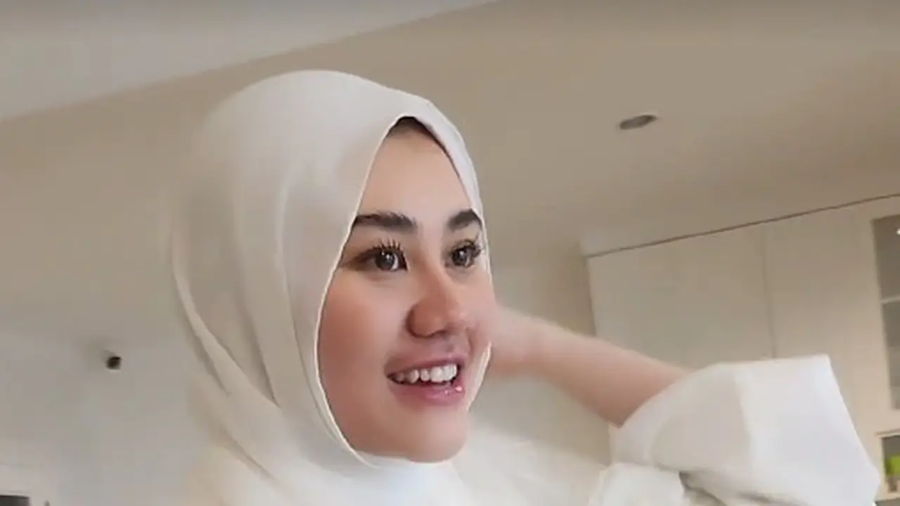 Aaliyah Massaid berhijab
