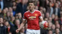 8. Michael Carrick menjadi kapten Manchester United pada 2017-2018.(AFP/Oli Scarff)