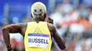 Gaya rambut pelari Jamaika, Janieve Russell bergambar emoji wajah tersenyum saat berkompetisi dalam semifinal nomor lari gawang 400 meter Olimpiade Paris 2024 di Stade de France, Paris, Prancis, 6 Agustus 2024. (AFP/Jewel Samad)