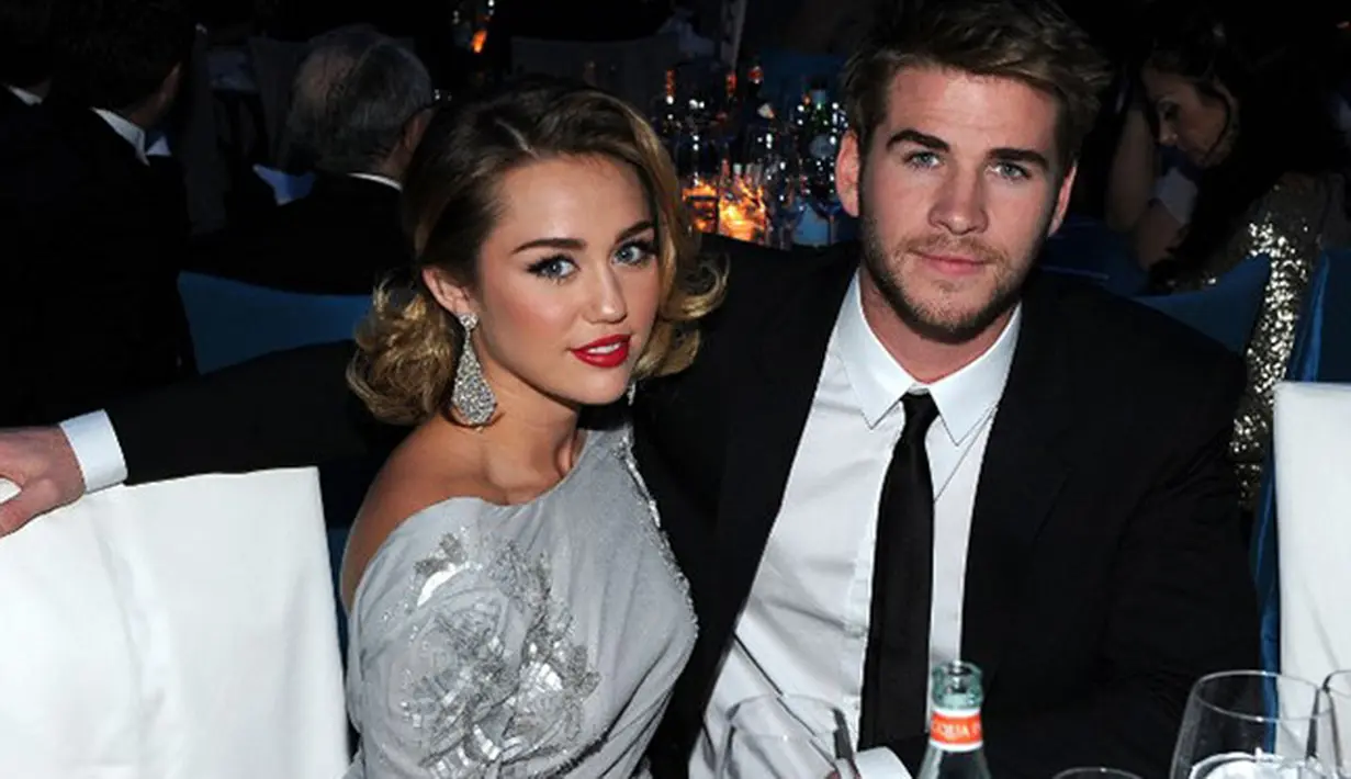Miley Cyrus dan Liam Hemsworth memang jarang terlihat di hadapan publik belakangan ini. Terlebih belum lama ini  Miley baru saja meluncurkan album terbarunya yang berjudul ‘Younger Now’. (AFP/Larry Bussaca)